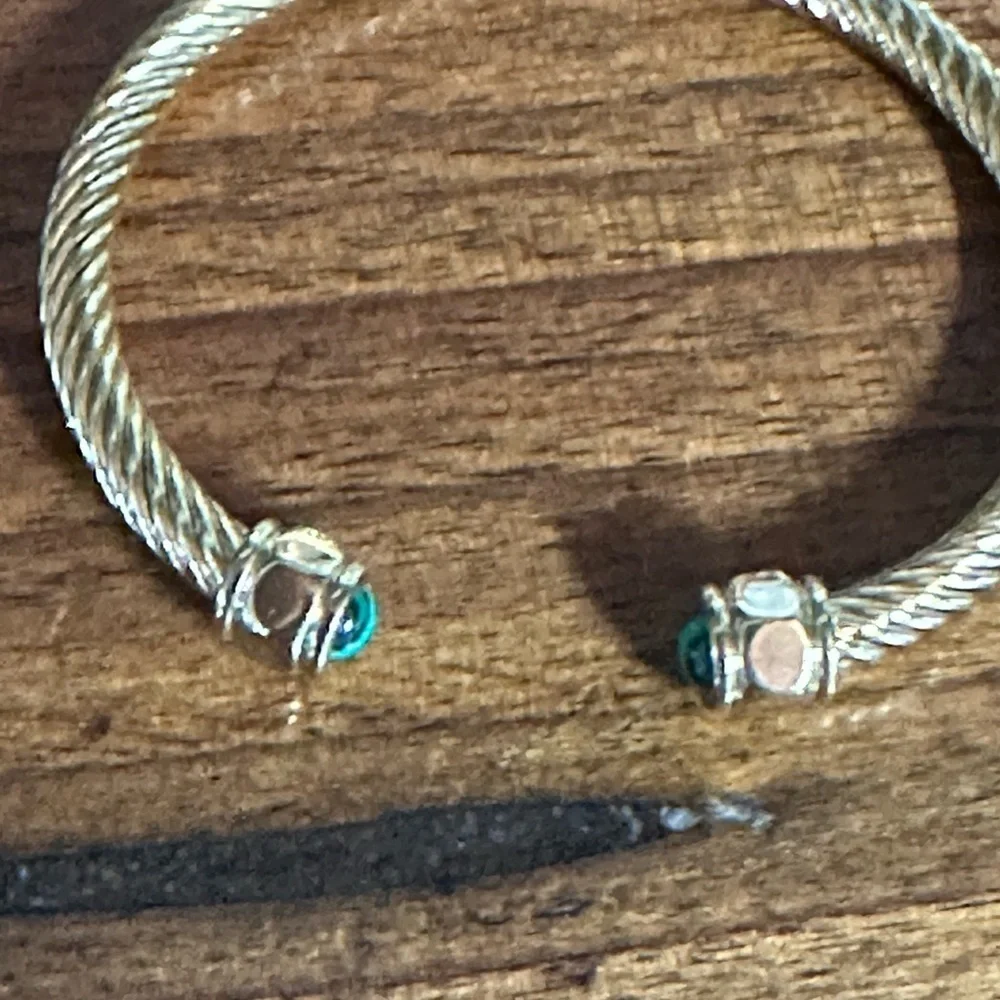 Gold Twisted Bracelet with green stone